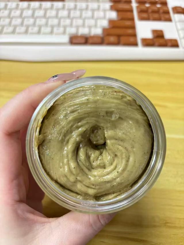 Close-up photo of the Chebe Butter texture inside the jar